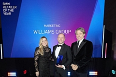 L-R Michelle Roberts, marketing director of BMW Group UK, Chris Woods, head of marketing at Williams with TV comedian John Bishop